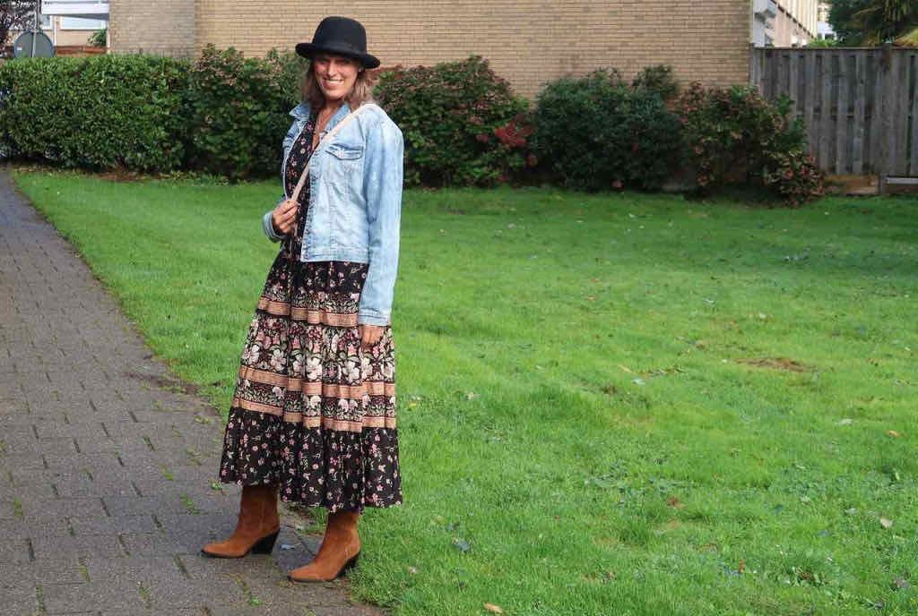 pairing brown boots with a long bohemian dress